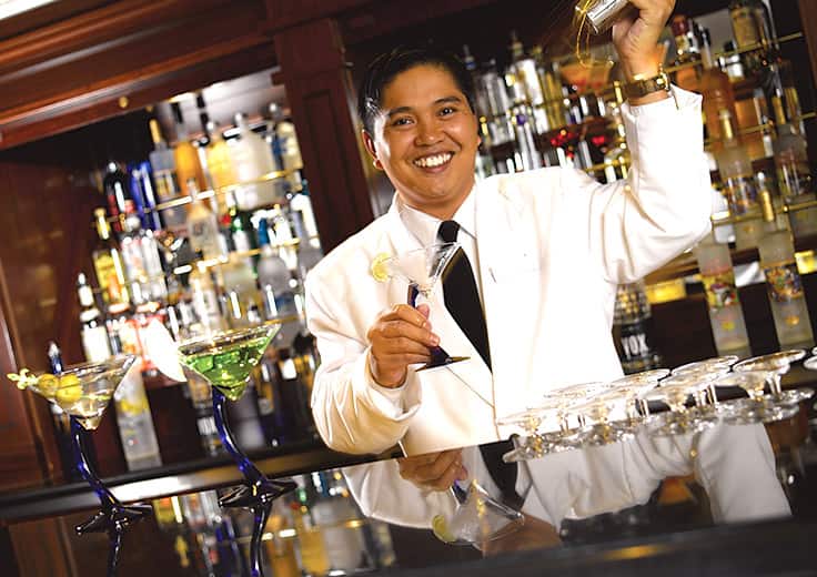Regatta Bars and Lounges Bartender Making Drinks
