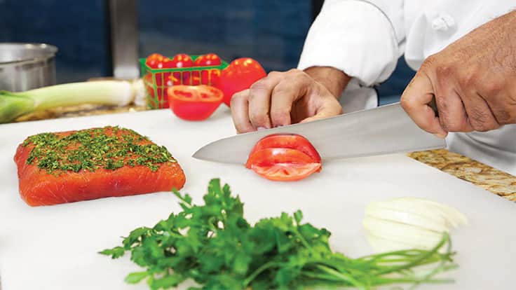 https://www.oceaniacruises.com/sites/default/files/our-chefs-tomato-slicing_0.jpg